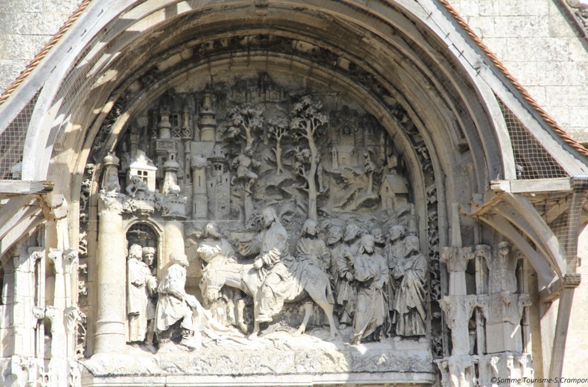 The tympanum of the church Notre-Dame of La Neuville
